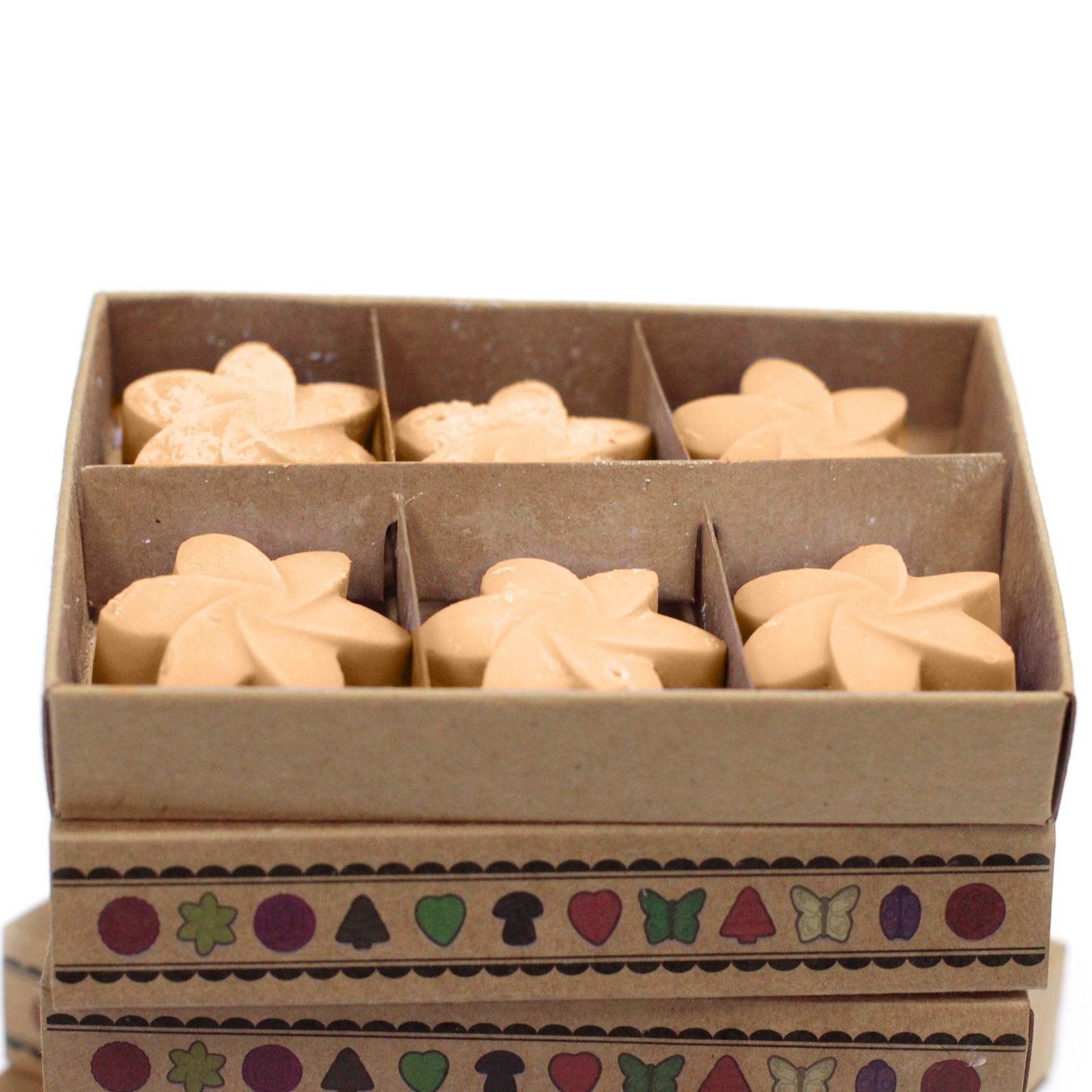 Midnight Jasmine soy wax melts arranged in eco‑friendly matchbox box