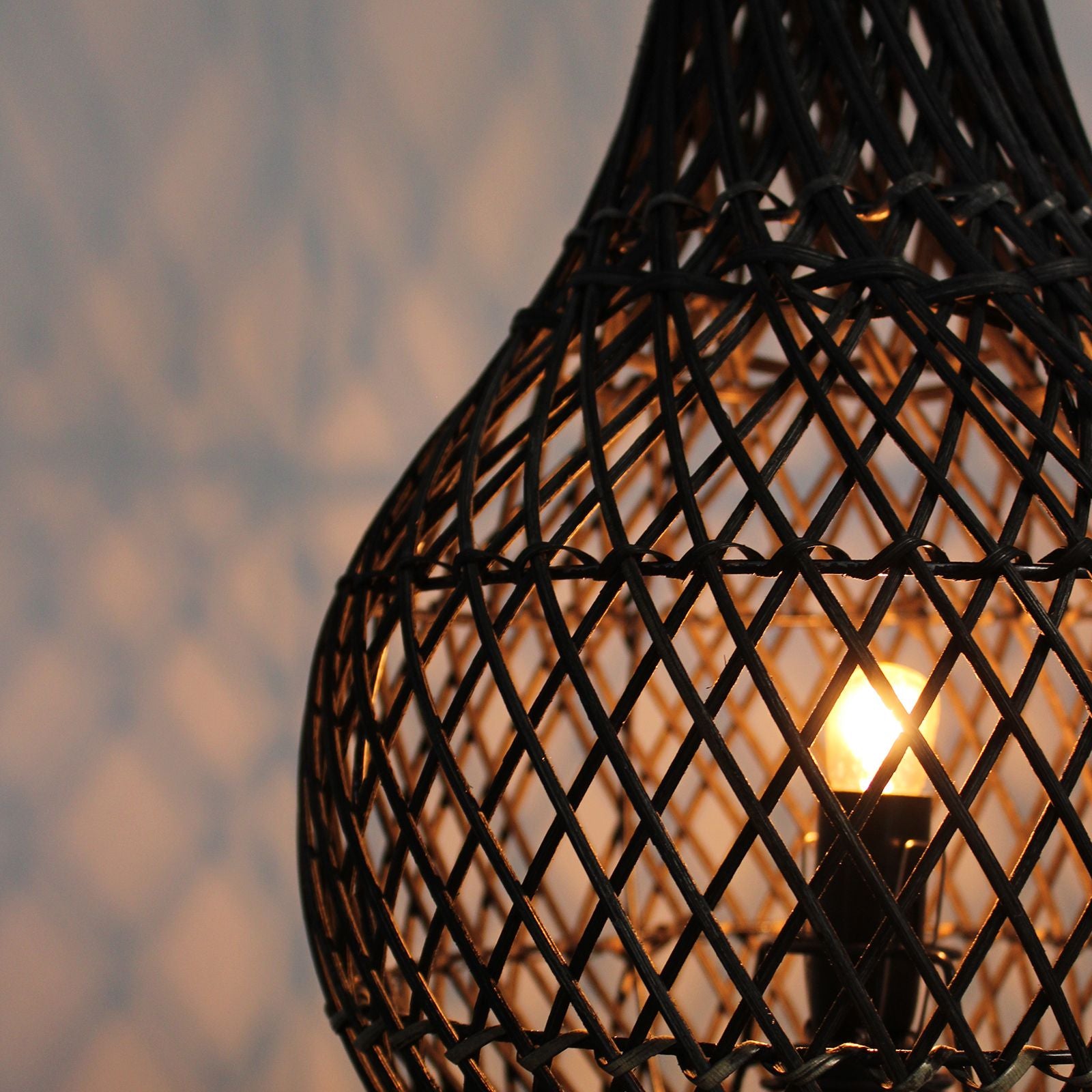 Handmade rattan table lamp with woven pattern