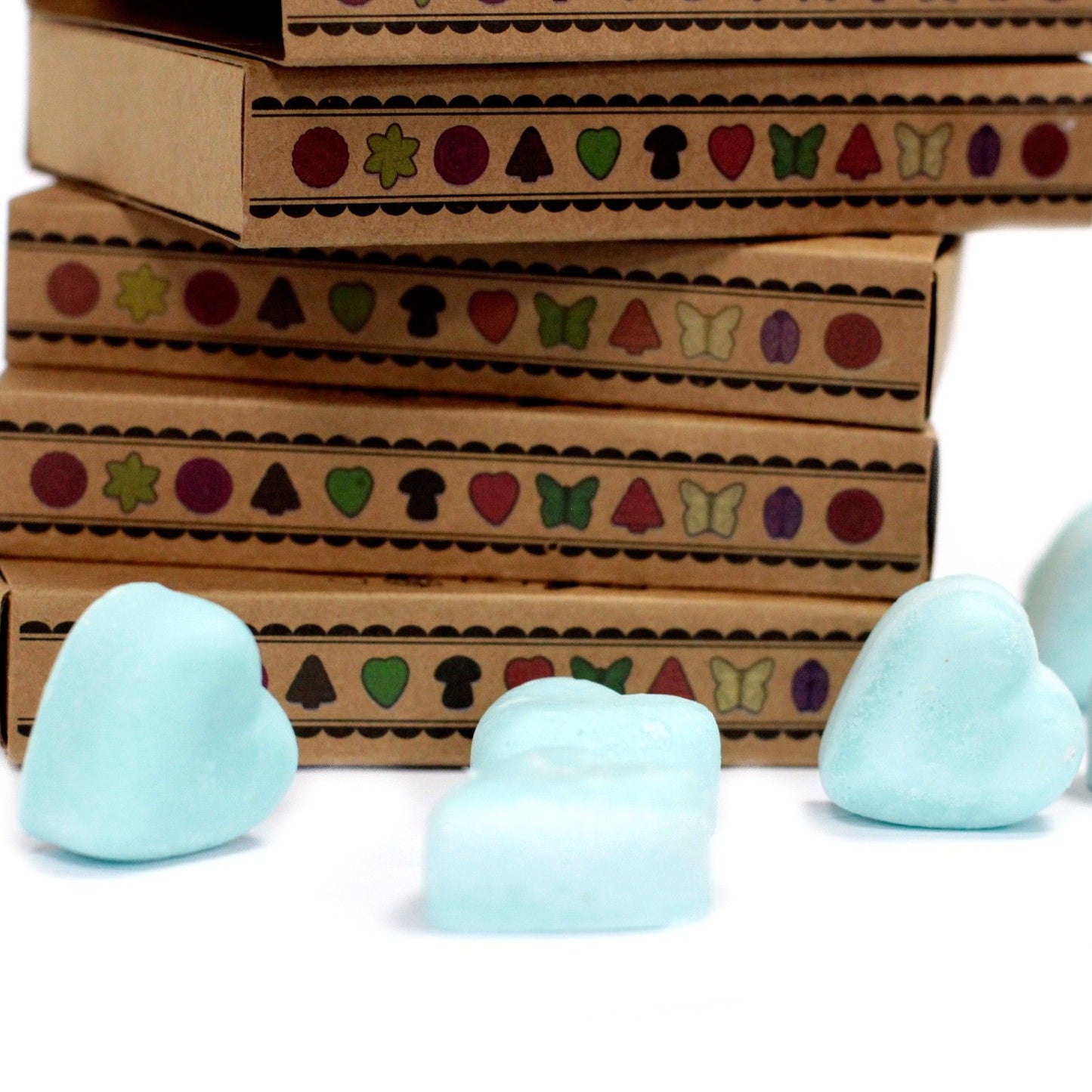 Natural soy wax melts displayed in matchbox packaging with dividers