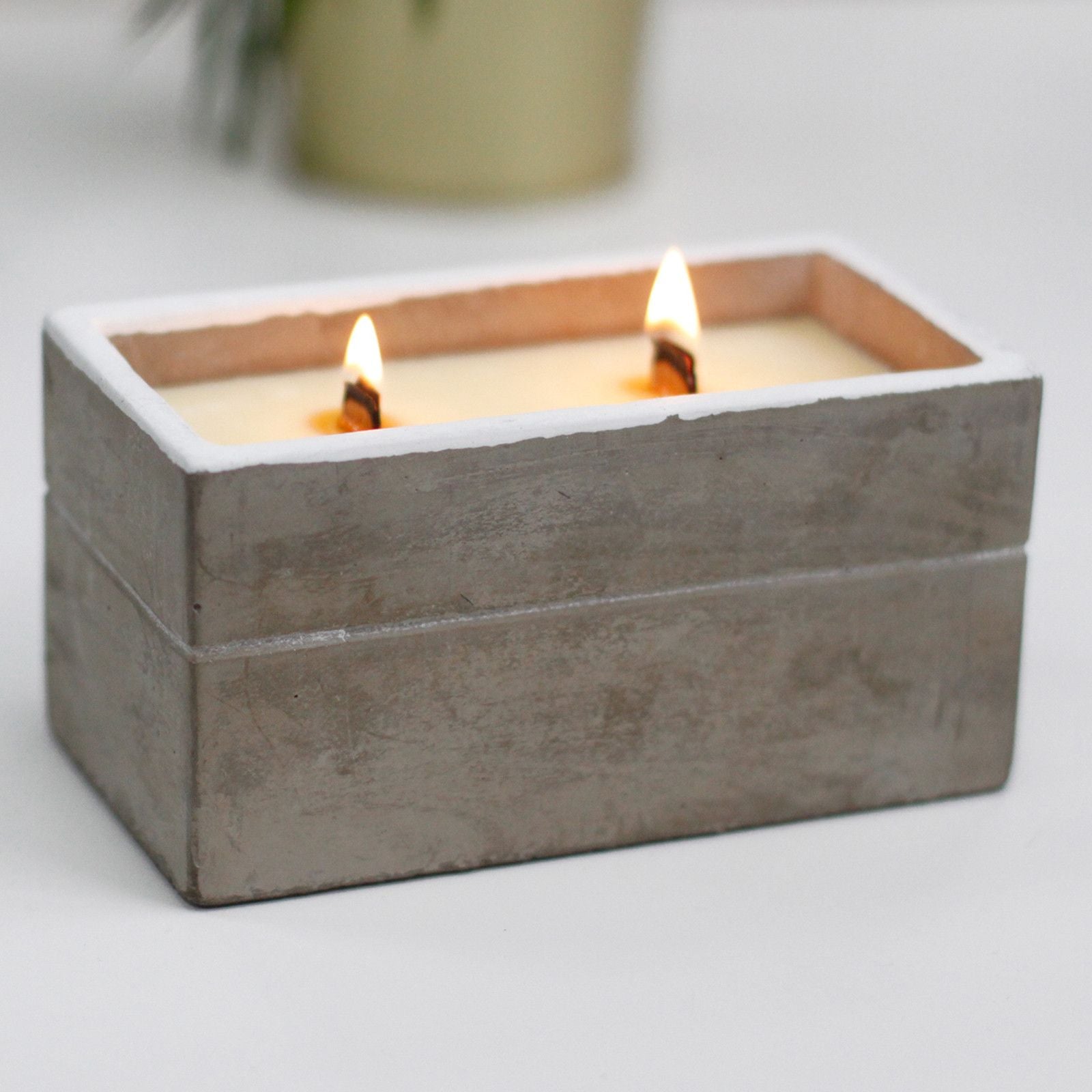 Rustic concrete pot candle with spiced lime aroma and wooden wick